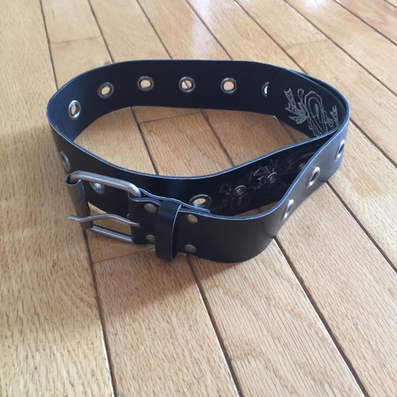 black belt with holes all around